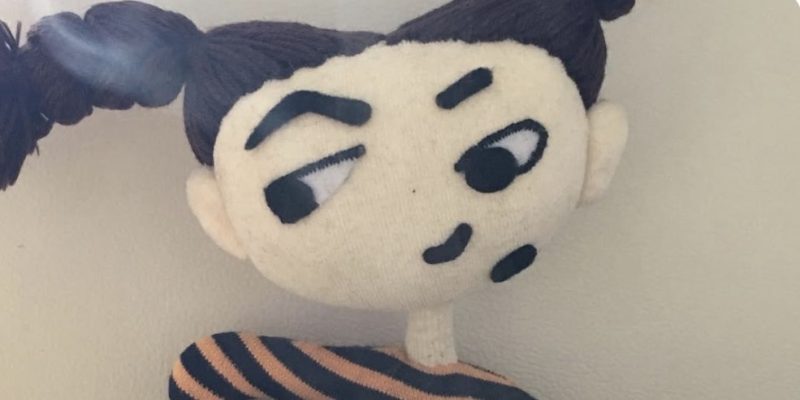 Marie sitzt vor einem Teller dampfender Spätzle mit gerösteten Semmelbröseln – schwäbische Kurzgeschichte